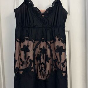 Beautiful vintage Betsey Johnson dress with pink satin lining.  Like new! Size 4